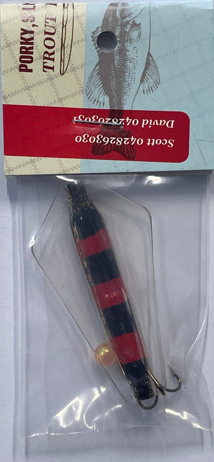 Fishing lure with packaging on a white background